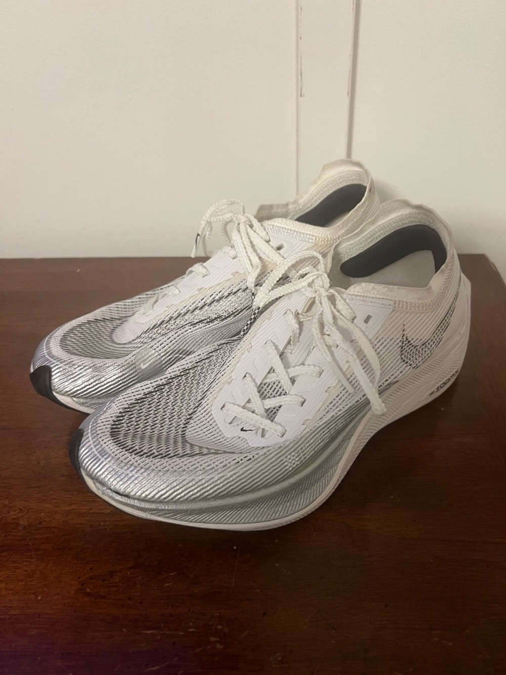 Nike ZoomX Vaporfly NEXT% 2 running shoes in white and metallic silver size 7